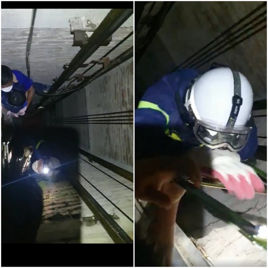 Lực lượng chức năng tiến hành giải cứu người mắc kẹt.