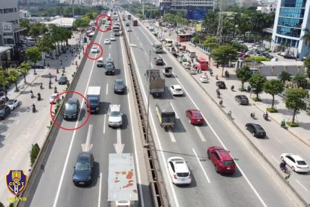 Đi vào làn dừng xe khẩn cấp trên Vành đai 3, tài xế xếp hàng dài chờ xử phạt